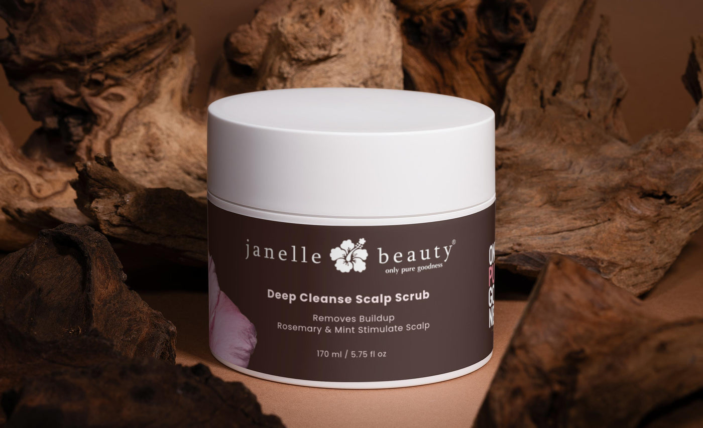 Janelle Beauty Deep Cleanse Scalp Scrub container with natural wood background